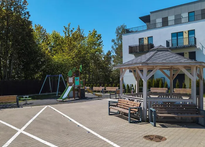 Апартаменты Sunny Seaside With Terrace & Parking By Renters Ястшембя-Гура